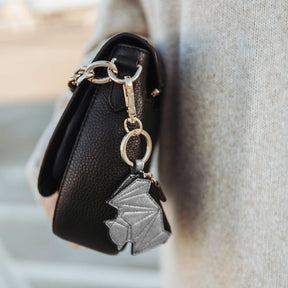 Schlüsselanhänger Zip it Bat mit Geldfach in silber-metallic mit Best Buddy schwarz
